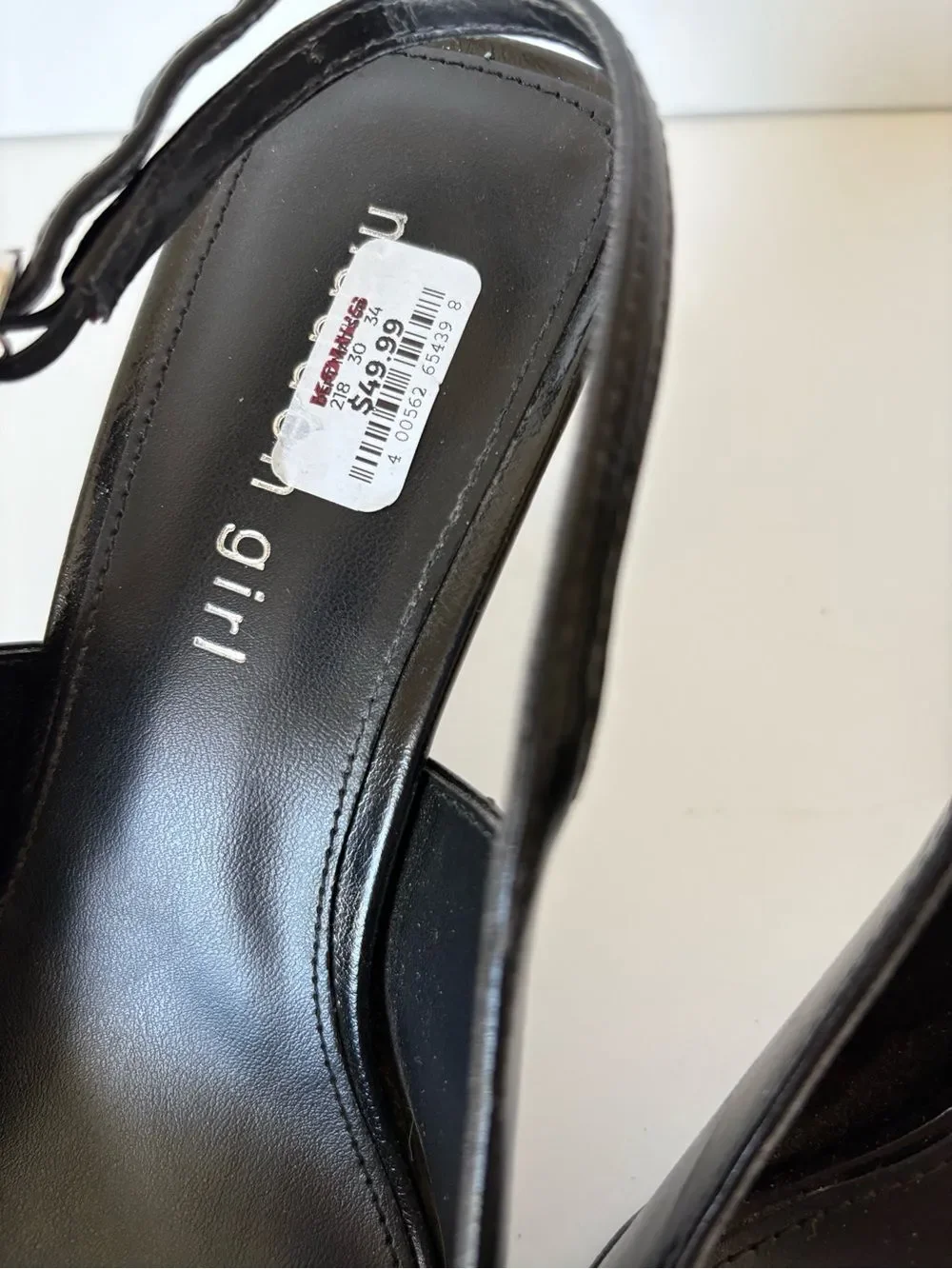 Madden Girl Black Pointed-Toe Slingback Heel with Silver Buckle
